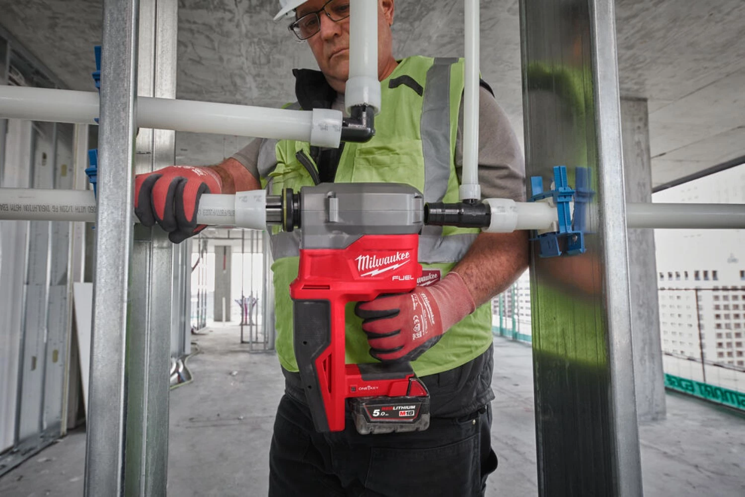 Milwaukee M18 FPXP-H10502C Kit de machine à expansion Uponor avec batterie Li-ion 18 V (2 batteries 5,0 Ah) dans un coffret-image