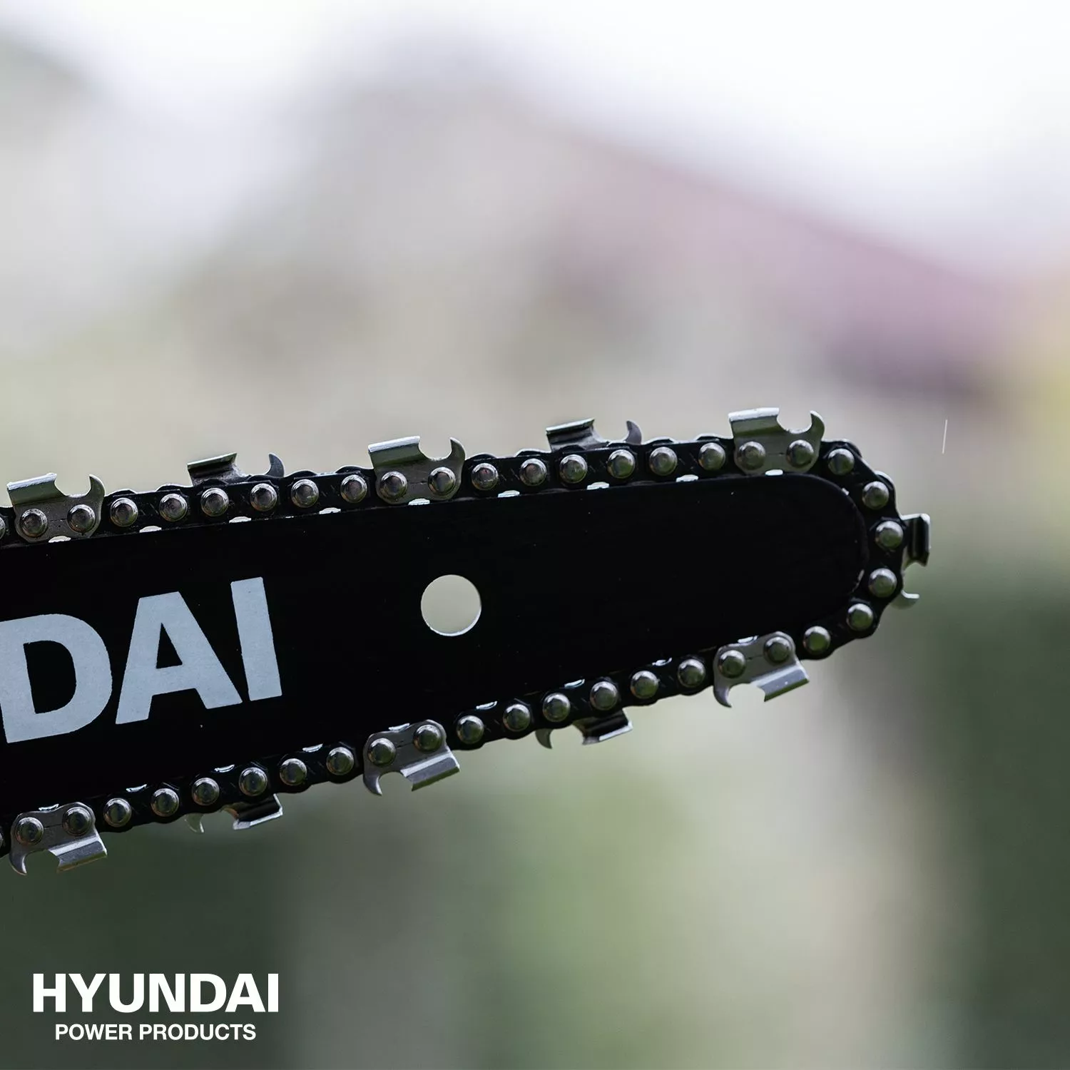 Hyundai 57257 benzine kettingzaag 25,4cc - 25cm - carved zwaard-image