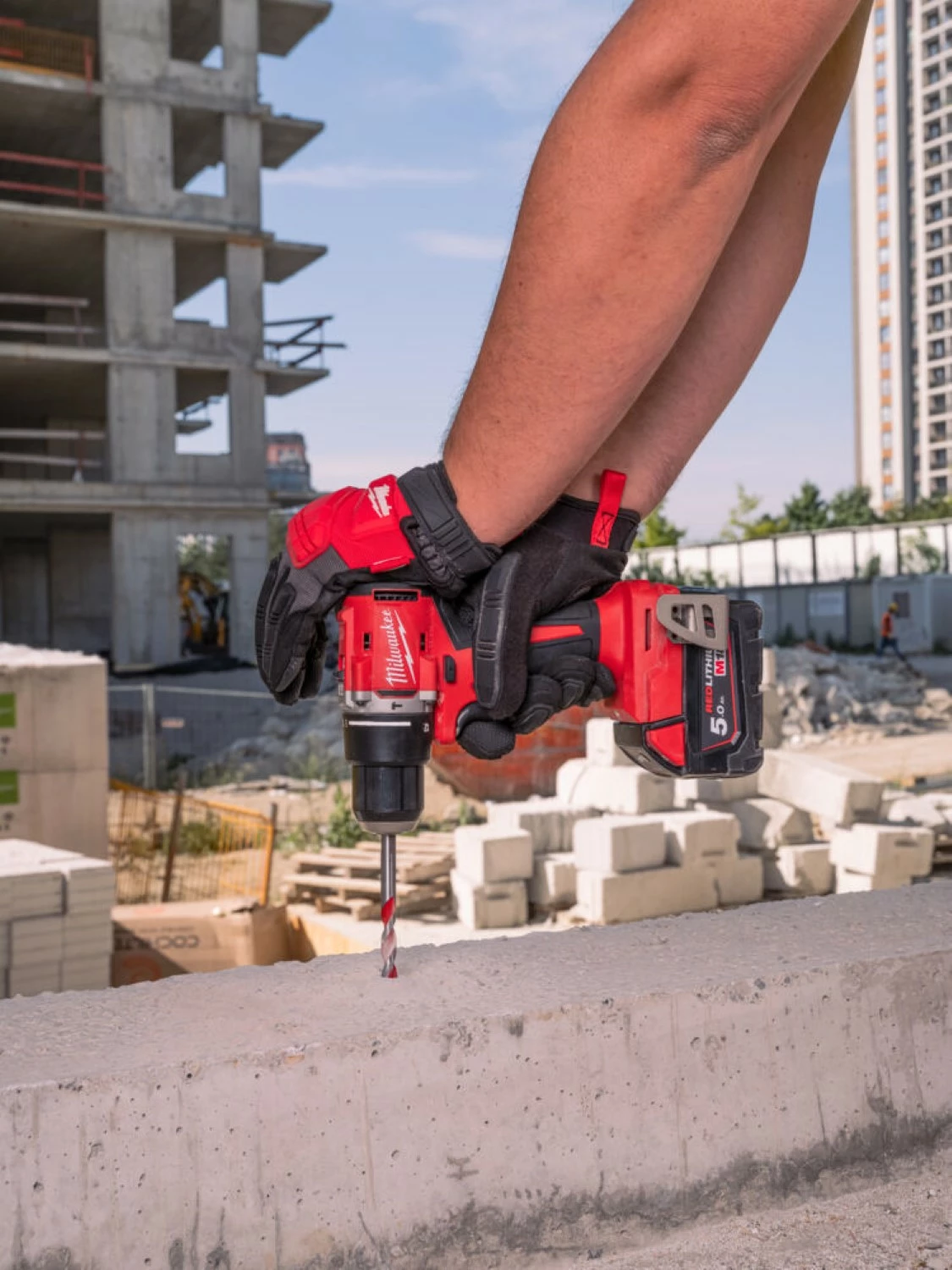 Milwaukee M18 BLPDRC-502C Perceuse à percussion (2x batterie 5.0Ah) - sans charbon - en coffret-image