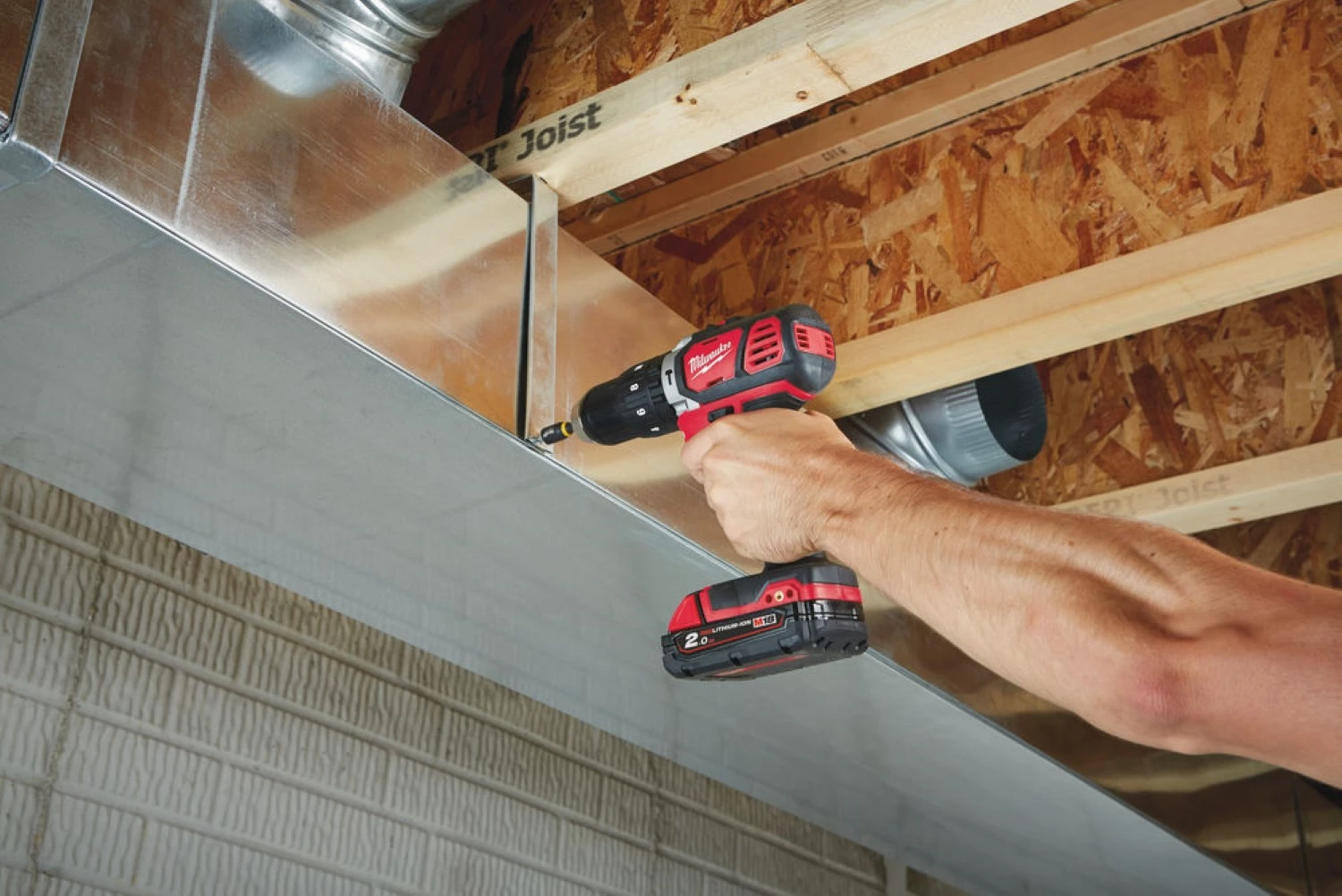 Milwaukee M18 BPD-202C - Set de Perceuse à percussion compacte 18V Li-Ion (2x 2.0Ah ) dans coffret-image