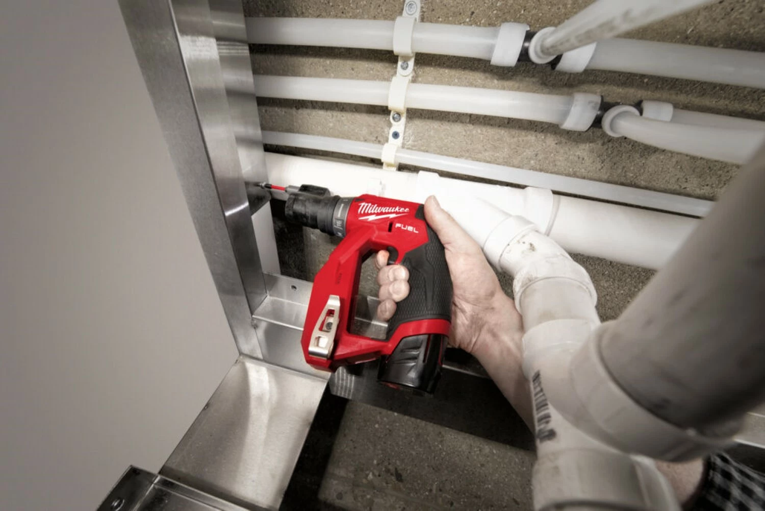 Milwaukee M12 FDDXKIT-0X Perceuse visseuse sans fil avec 4 mandrins amovibles - 12V Li-ion - 34 Nm - Machine seule-image